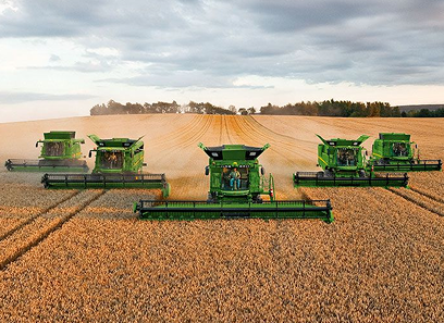 Multiple combine harvesters in a field